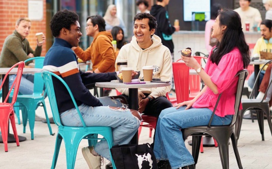 Three students sitting together